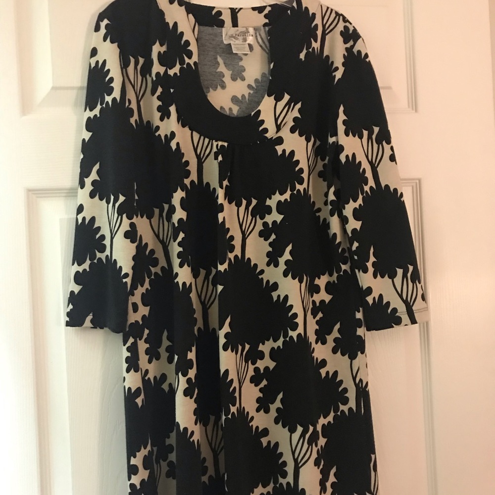 Quarter length sleeve dress just below the knees